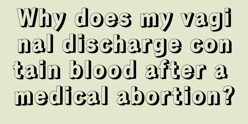 Why does my vaginal discharge contain blood after a medical abortion?