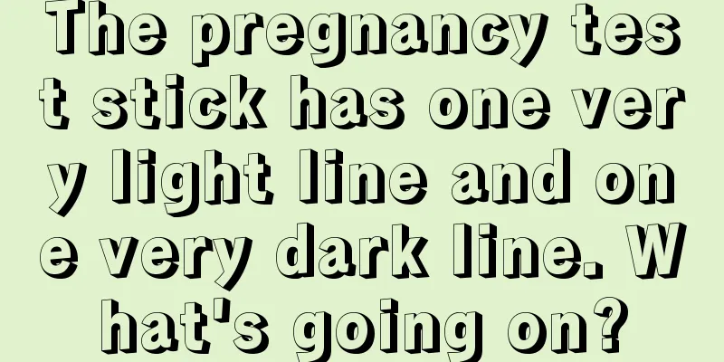 The pregnancy test stick has one very light line and one very dark line. What's going on?
