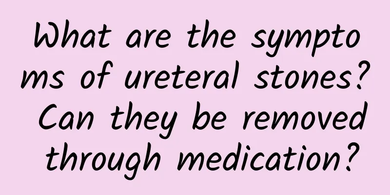 What are the symptoms of ureteral stones? Can they be removed through medication?